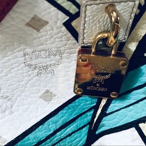 Designer Bag MCM, price reflects ink marks inside